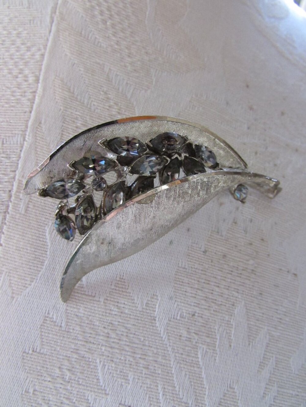 BSK Brooch Silver Tone Leaf & Rhinestones